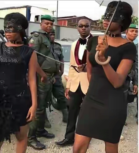 Lagos state governor, Ambode, Orders Arrest of Pretty Mike for Putting Girls on Dog Chains