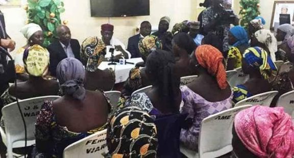 finally 82 freed chibok girls arrive abuja