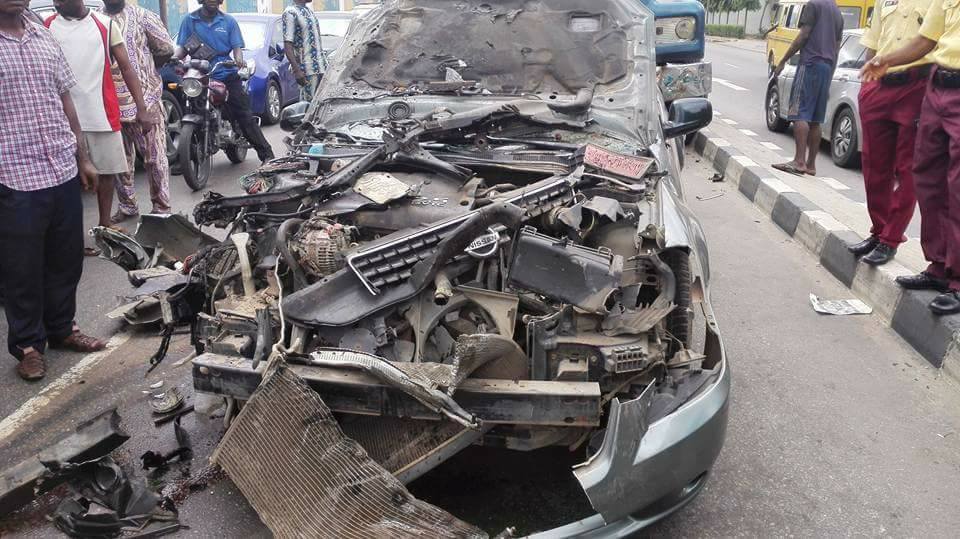 This Is Unbelievable As Husband And Wife Survive Multiple Car Accident In Ikeja, Lagos [Photos]