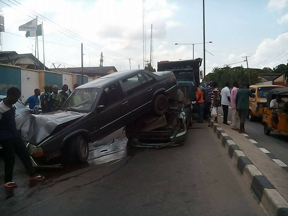 This Is Unbelievable As Husband And Wife Survive Multiple Car Accident In Ikeja, Lagos [Photos]