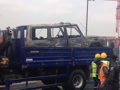 PHOTOS: Lucky Governor Fayose Cheats Death As His G-Wagon Catches Fire In Lagos