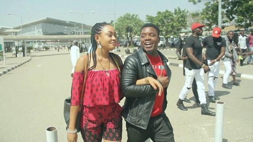 Two Nigerians Comedians Proposes To Their Girlfriends At Abuja Airport, Same Time [Photo]
