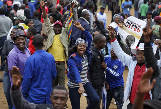 Thousands of protesters take to the streets chanting 'Robert Mugabe must go'