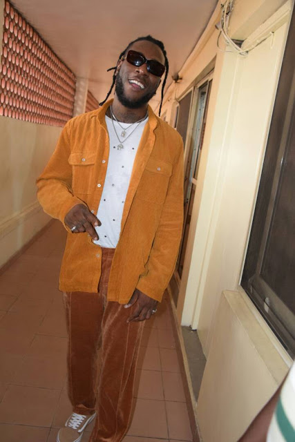 Burnaboy Pictured with Police Commissioner After He Submitted Himself to Police Yesterday