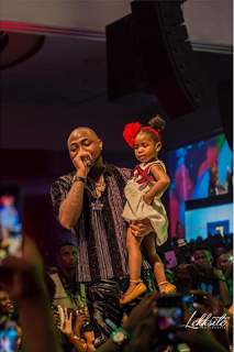 Davido Brings His Daughter Imade On Stage at His Show [Photo]