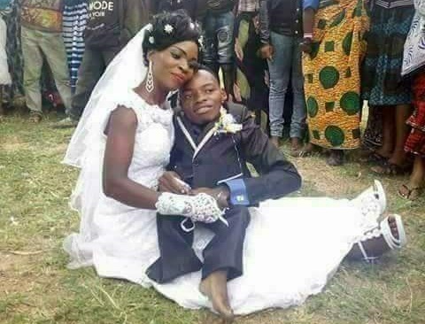 Too much love: Lady carries her physically challenged husband as they posed for photos on their wedding day 