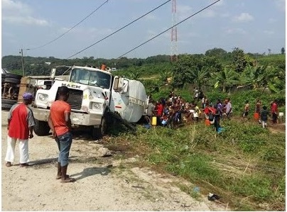 Ignorant Residents, Scooping Petroleum Product from Fallen Tanker Along Calabar-Odukpani Federal Highway