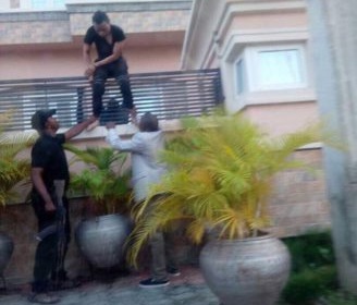 Photo Of Bobrisky Thrown Over The Gate By Policemen Who Arrested Him