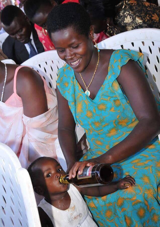 Viral Photo Of Woman Feeding Her Toddler Beer At An Event