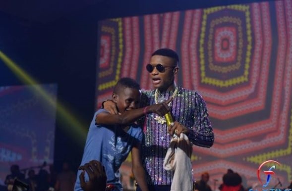Wizkid Signs 12-Year-Old Boy At His Concert, Blesses Him With N10 Million [Videos]