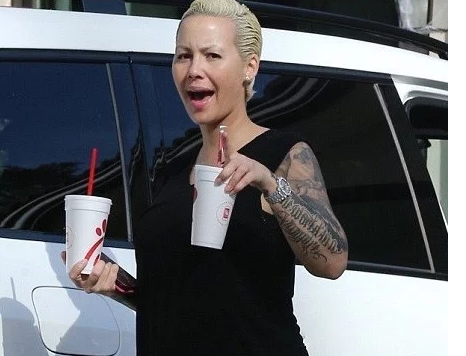 Amber Rose Shows Off Her Smaller Boobs As She Makes First Appearance After Successful Breast Reduction Surgery [Photos]
