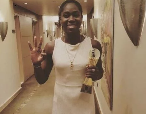 Nigerian Female Footballer, Asisat Oshoala Shows Off Her Third Female African Player Of The Year Award [Photos]