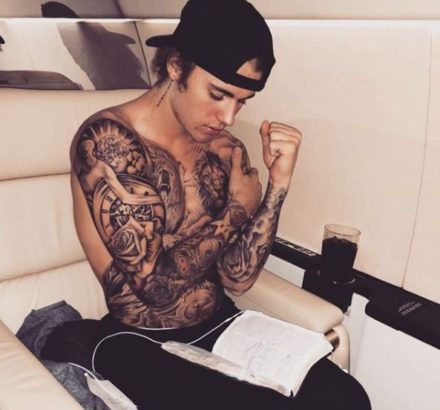 Born-Again Justin Bieber, Spotted Reading the Holy Bible On a Plane [Photos]
