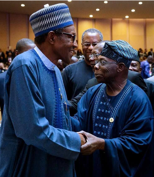 Happier Photos of President Buhari and Obasanjo Laughing at AU Summit