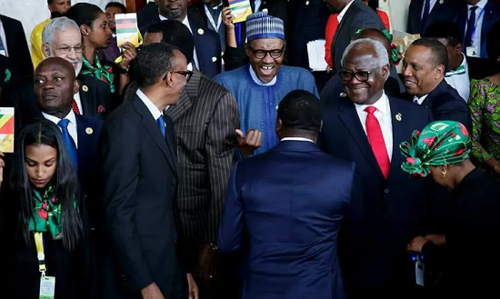 Happier Photos of President Buhari and Obasanjo Laughing at AU Summit