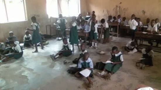 Heart Melting Photos Of Pupils Taking Lessons On Bare Floor In A Community That Hosts 6 Oil Wells In Delta