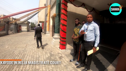 Davido's crew member remanded in prison after failing to meet bail conditions  One of Davido’s crew members who was accused of causing havoc at the Murtala Muhammed International Airport yesterday might be spending the weekend in prison as his bail conditions were not perfected until the close of work on Friday.  The police arraigned 22-year-old Umarudeen Kayode on a 5 count charge at the Ikeja Magistrate court, before Mrs. E. Kubanje.    He was granted bail conditions to the tune of N50, 000 and two sureties in like sum. The sureties must have variable addresses within the jurisdiction of the court.  However, as at 4 pm on Friday when SaharaReporters was in the premises of the magistrate court, the bail conditions had not been perfected. The magistrate had also left the court as Mr. Umarudeen’s relatives were trying to perfect the bail conditions.  SaharaReporters saw him being conveyed with the prison van out of the court premises a few minutes after 4 pm. Mr. Umarudeen was charged for assault, breach of public peace and for resisting arrest.  Mr. Umarudeen was arrested  by airport security officials and handed over to the Nigerian police for investigation and prosecution.   Crisis broke out when a Checkpoint staff at the airport attempted to verify some of the checked luggage with the attached tags, but, rather than allow the staff to carry out his official duty, Davido’s aide (Kayode) insisted that he would not allow him to verify the luggage, which after much arguments and insistence, led to fisticuffs.  Kayode punched the Checkpoint staff on the face, which attracted other security officials at the terminal who immediately attempted to arrest the aide. Rather than obey, he resisted arrest and pummeled another airport security staff attached to the Federal Airports Authority of Nigeria at the baggage claim area, an Assistant Customs Comptroller was also injured.  Throughout the crisis, Davido hid in a car within the premises of the airport hoping to sprint Kayode away from the airport with the help of officials he'd mobilized with cash.  Saharareporters