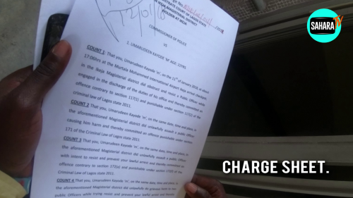 Davido's crew member remanded in prison after failing to meet bail conditions  One of Davido’s crew members who was accused of causing havoc at the Murtala Muhammed International Airport yesterday might be spending the weekend in prison as his bail conditions were not perfected until the close of work on Friday.  The police arraigned 22-year-old Umarudeen Kayode on a 5 count charge at the Ikeja Magistrate court, before Mrs. E. Kubanje.    He was granted bail conditions to the tune of N50, 000 and two sureties in like sum. The sureties must have variable addresses within the jurisdiction of the court.  However, as at 4 pm on Friday when SaharaReporters was in the premises of the magistrate court, the bail conditions had not been perfected. The magistrate had also left the court as Mr. Umarudeen’s relatives were trying to perfect the bail conditions.  SaharaReporters saw him being conveyed with the prison van out of the court premises a few minutes after 4 pm. Mr. Umarudeen was charged for assault, breach of public peace and for resisting arrest.  Mr. Umarudeen was arrested  by airport security officials and handed over to the Nigerian police for investigation and prosecution.   Crisis broke out when a Checkpoint staff at the airport attempted to verify some of the checked luggage with the attached tags, but, rather than allow the staff to carry out his official duty, Davido’s aide (Kayode) insisted that he would not allow him to verify the luggage, which after much arguments and insistence, led to fisticuffs.  Kayode punched the Checkpoint staff on the face, which attracted other security officials at the terminal who immediately attempted to arrest the aide. Rather than obey, he resisted arrest and pummeled another airport security staff attached to the Federal Airports Authority of Nigeria at the baggage claim area, an Assistant Customs Comptroller was also injured.  Throughout the crisis, Davido hid in a car within the premises of the airport hoping to sprint Kayode away from the airport with the help of officials he'd mobilized with cash.  Saharareporters