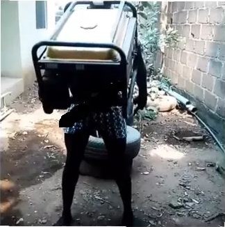 Shocker!!! Nigerian Man Carries Generator With His Teeth