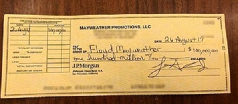 Floyd Mayweather Shows Off $100m Cheque He Earned from Conor McGregor Fight