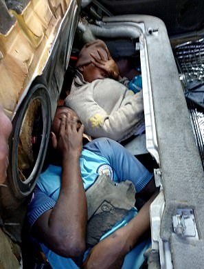 Photos Of Four Suspected Migrants Caught While Hiding Under Car Bonnet To Sneak Into Europe