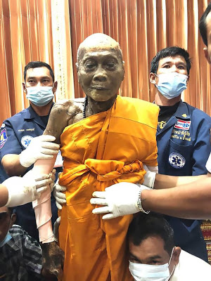 Dead Monk Full Of Smiles As His Body Is Exhumed 2 Months After Being Buried [Photos]