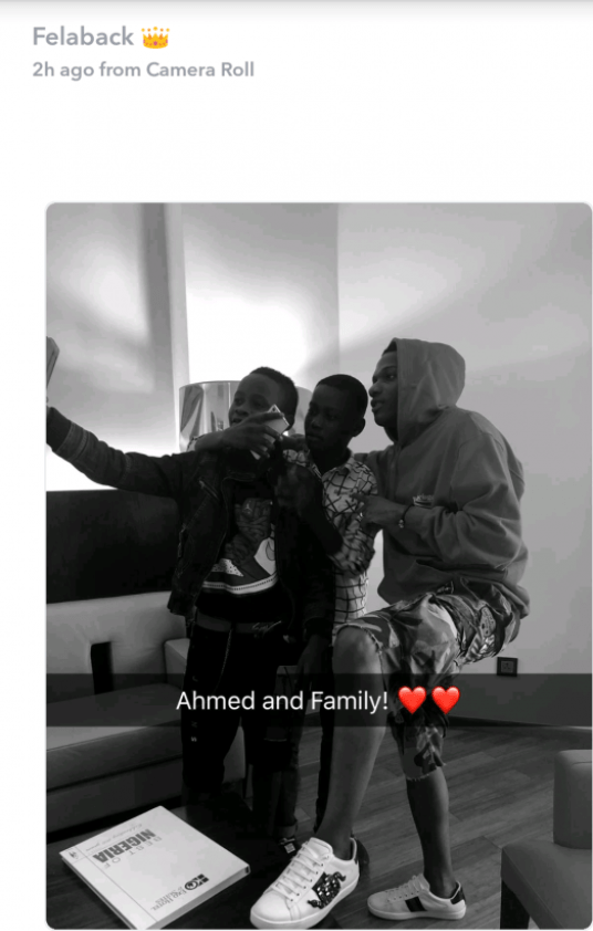 Wizkid Shares New Photos with Little Boy He Recently Signed At His Concert