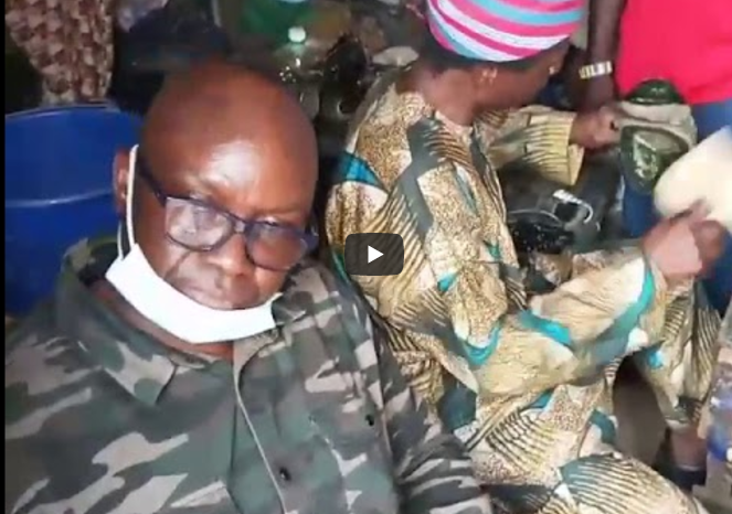 Governor Fayose Relaxes as Hausa Cobbler Works On His Shoe [Video]