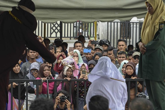 Two People Flogged Mercilessly in Indonesia for Playing Children’s Video Game [Photos]