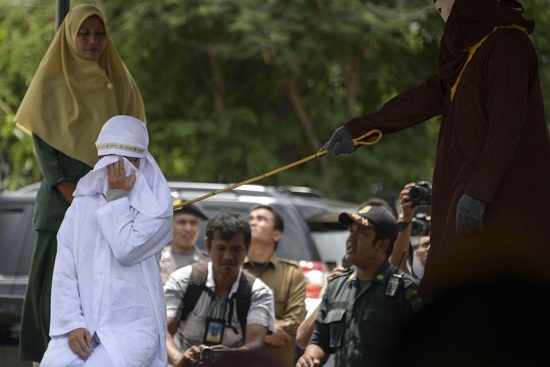 Two People Flogged Mercilessly in Indonesia for Playing Children’s Video Game [Photos]