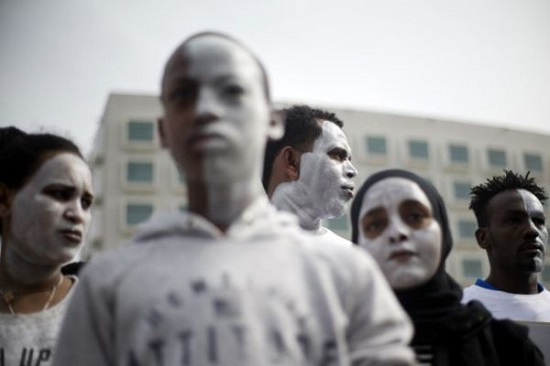 To Avoid Deportation, Africans in Israel Paints Their Faces White 