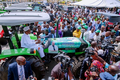 President Buhari Spotted Driving a Tractor in Jos, Plateau State [Photos]