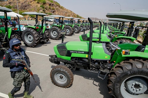 President Buhari Spotted Driving a Tractor in Jos, Plateau State [Photos]