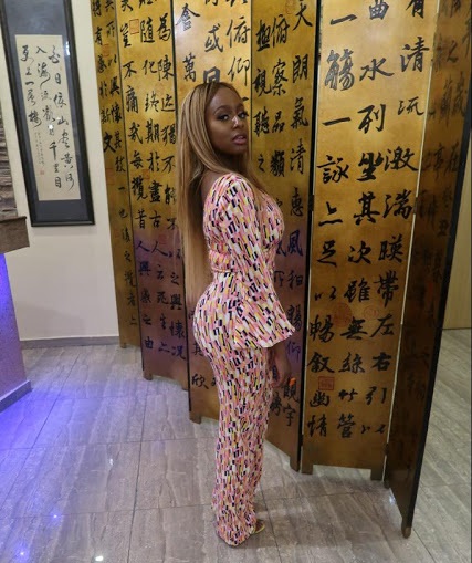 Billionaire Daughter, Dj Cuppy Poses On Her Bulletproof G-Wagon