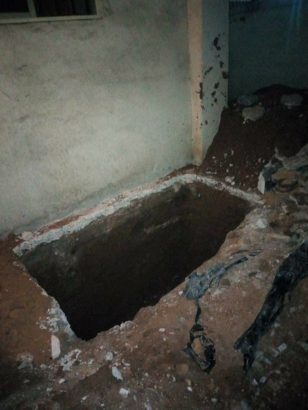 Man Forced by Imo State Govt. To Exhume His Late Parents’ Remains Over Road Expansion [Photos]