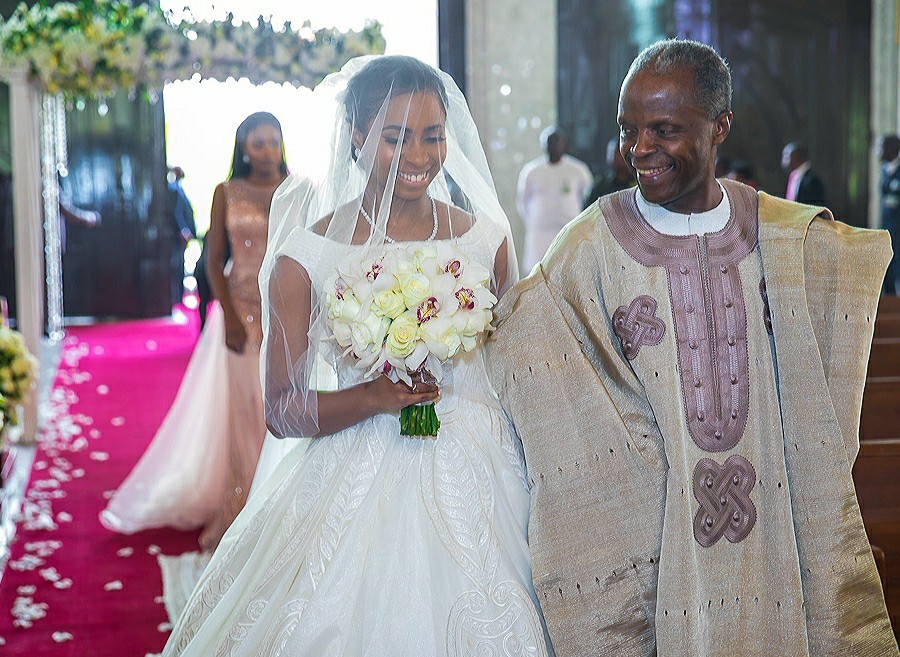 Heart Melting photos of V.P Yemi Osinbajo walking his daughter down the aisle at her wedding in Abuja yesterday