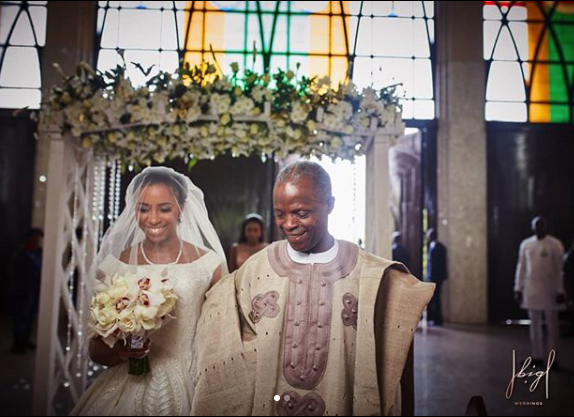 Heart Melting photos of V.P Yemi Osinbajo walking his daughter down the aisle at her wedding in Abuja Yesterday