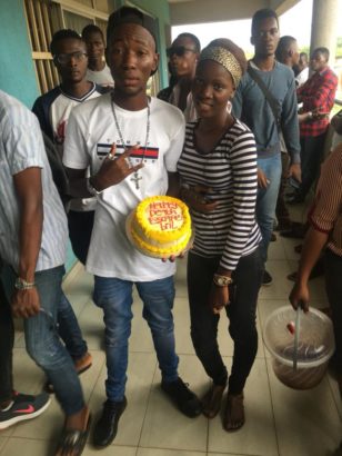 Nigerian Man, Who Escapes Death From Drunk Policeman, Celebrates With Cake