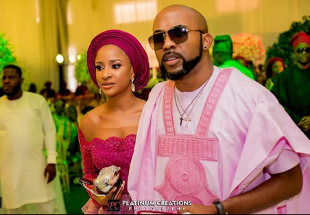 Photographer Captures Banky W Adjusting Adesua’s Gele
