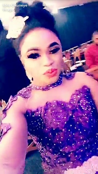 Popular Nigerian cross-dresser, Bobrisky attended a wedding over the weekend, and he was one of the bridesmaids.  Seems like some Nigerians are gradually accepting the controversial male barbie in all his glory as he appeared really happy and comfortable in the photos he shared on his Snap.  See more photos below;    Recall that he was attacked by a lady at a commercial bank recently over his mode of dressing.  According to eyewitnesses, Bobrisky stated that he would tear her wig and wait for the police to come take them in handcuffs – the men at the bank could be seen clearly in the video and not unnerved about the ongoing argument.  Though it was gathered that the cross-dresser got support from other women in the bank, who believed that the attacker should have minded her business and leave the guy alone.  Watch below: