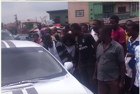 American wonder; Nigerians Mob A Self-Driving Car For The First Time [Video]
