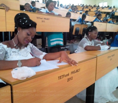 Two Students Of Benue University Write Final Exams In Their Wedding Gowns [Photos]