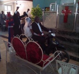 Groom Rides His Bride Down the Aisle with Motorcycle In Benue [Photos]