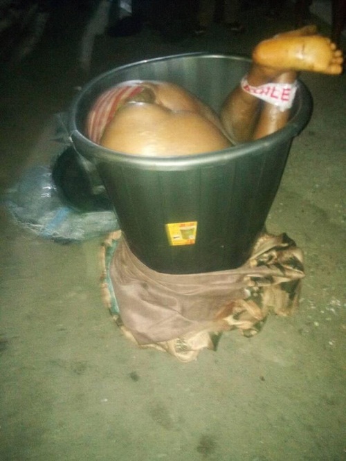 Desperate Nigerian Guy Kills His Girlfriend for Ritual, Stuffs Her Body In A Bucket [Graphic Photos]