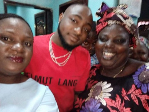 Photos of Davido as he Visits Roadside Eatery in Ibadan to enjoy hot Amala and Ewedu [Photos]