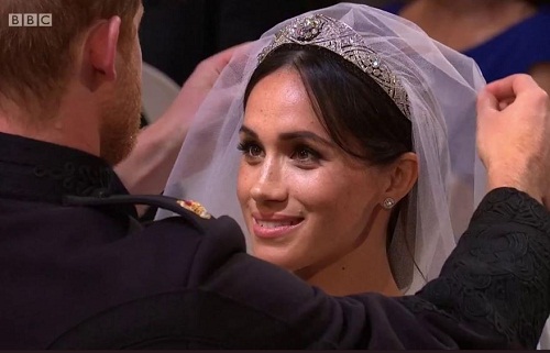 #RoyalWedding: Prince Harry and Wife to Be All Smiles As He Removes Her Veil [Photos]