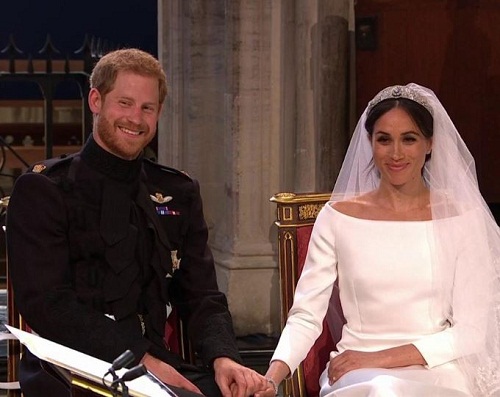 #RoyalWedding: Prince Harry and Wife to Be All Smiles As He Removes Her Veil [Photos]