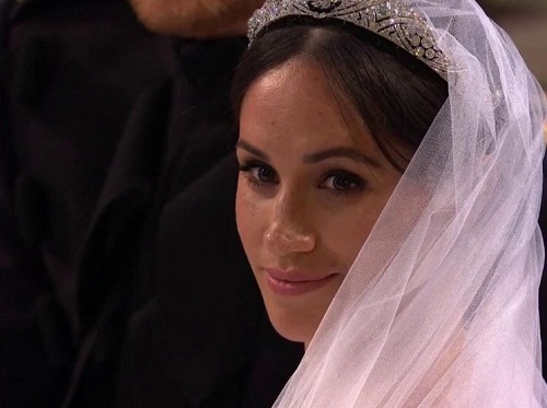 #RoyalWedding: Prince Harry and Wife to Be All Smiles As He Removes Her Veil [Photos]