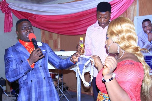 Lady Whose Photo Went Viral After A 'Prophet' Was Pictured Removing Her Underwear In Church, Has Reacted