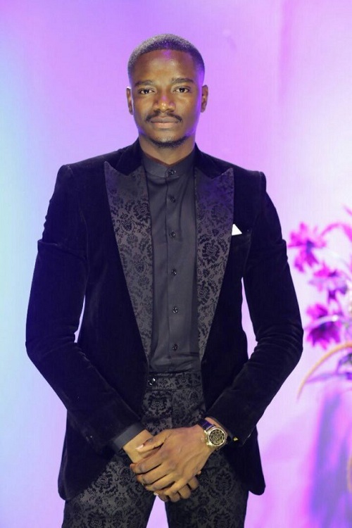 #BBNaija: Leo looks dapper as he rocks a black suit in latest photos